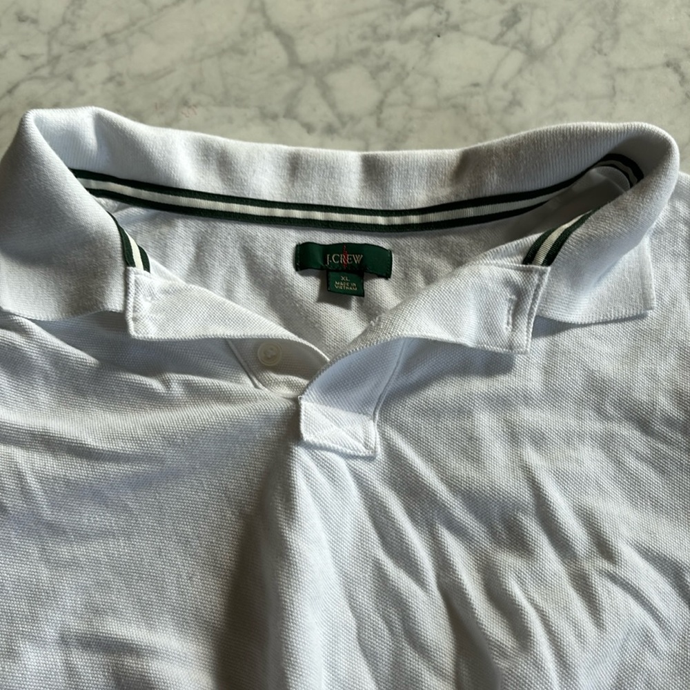 J. Crew white polo with dark green detailing. XL.